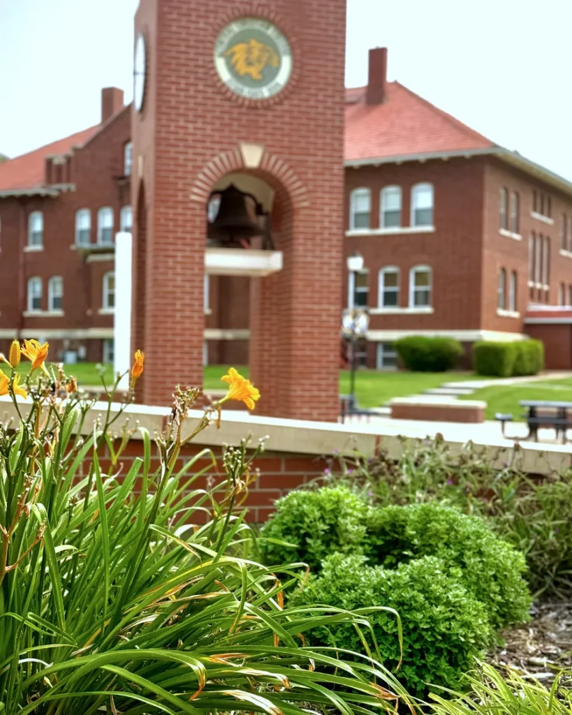 Exterior view of the Briner Academic Center on the Central Christian College of Kansas campus, surrounded by landscaped green space.