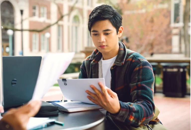 Student receiving one-on-one writing assistance from staff at the Writing Center at Central Christian College of Kansas.