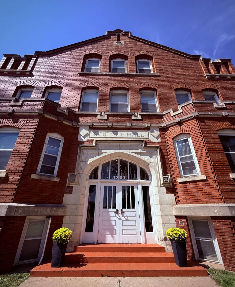 Science Hall with flowers